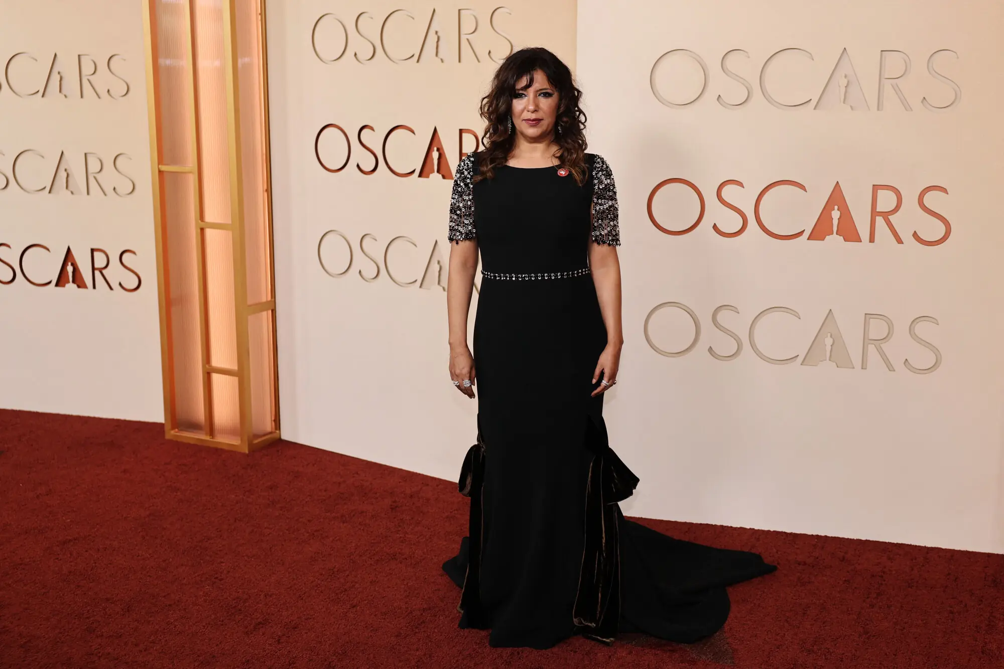 Tunisian filmmaker Kaouther Ben Hania, the director of The Voice of Hind Rajab, poses at the Oscars red carpet. Photo: Reuters