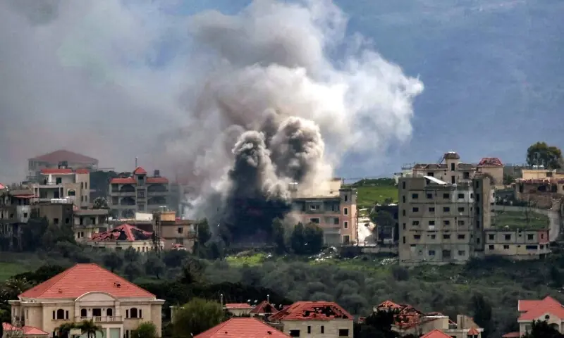 Smoke plumes rise following Israeli bombardment on the village of Khiam in southern Lebanon near the border with Israel, as seen from nearby Marjayoun, on March 16, 2026. &mdash;AFP