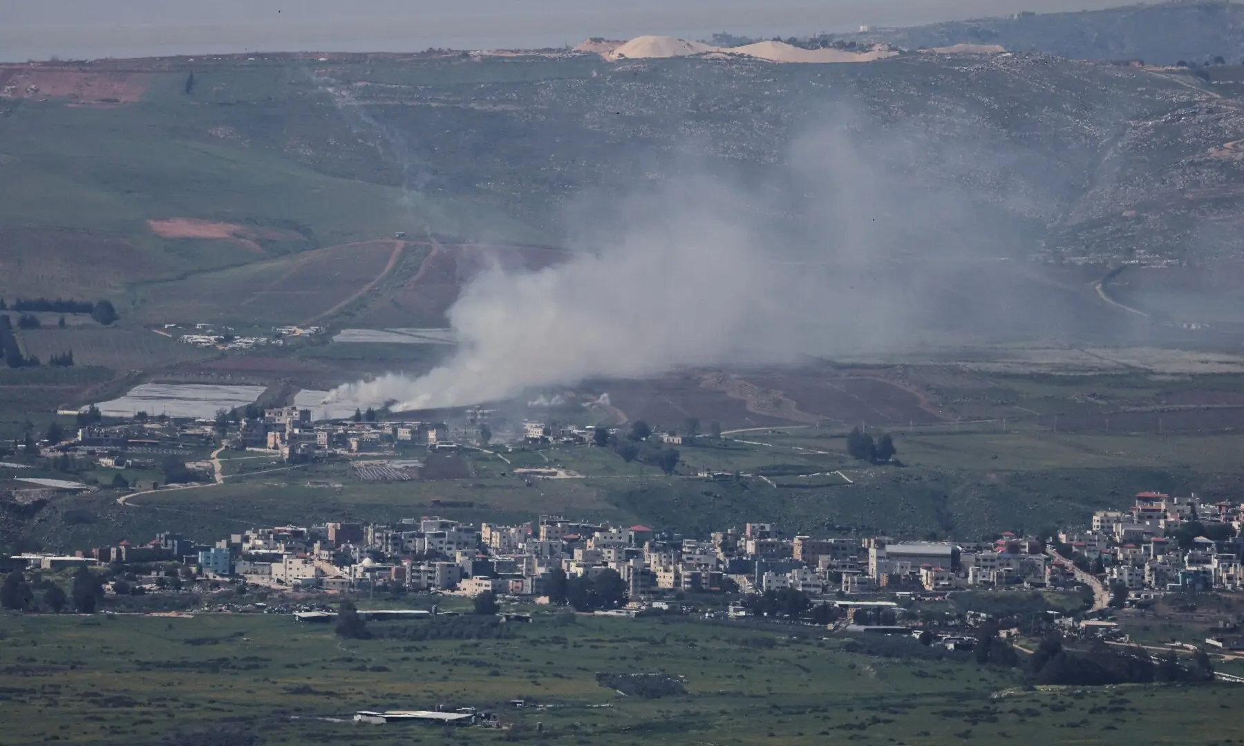 Smoke rises on Lebanon&rsquo;s side of the border with Israel, amid escalation between Hezbollah and Israel, as seen from northern Israel on March 17. &mdash; Reuters