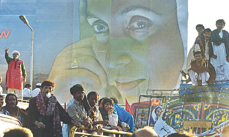  Supporters of Benazir Bhutto gather near the airport in Karachi upon her return to Pakistan on October 18, 2007: a bomb attack targeting Benazir&rsquo;s motorcade took place later that day, which resulted in at least 180 deaths | AFP 