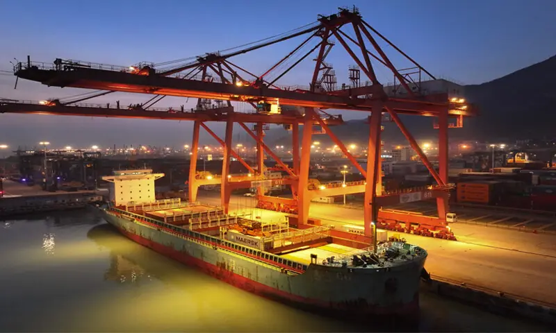 A cargo ship is docked at the container terminal in Lianyungang, eastern China, on Tuesday. War-risk charges range from $3,500 to $4,000 per TEU.&mdash;AFP