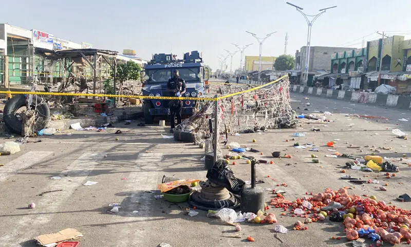 A Nigerian police truck stands at a deserted market the morning after multiple explosions struck the northeastern city of Maiduguri.—Reuters A Nigerian police truck stands at a deserted market the morning after multiple explosions struck the northeastern city of Maiduguri.—Reuters