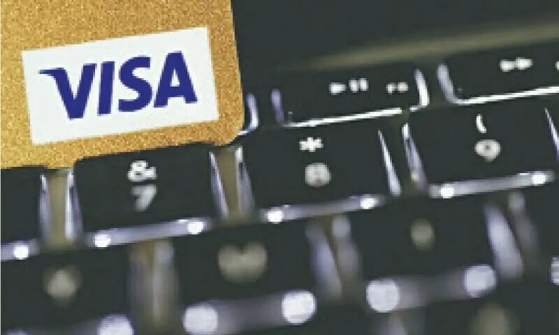 A file photo showing a Visa card resting on a keyboard. &mdash; Reuters/File