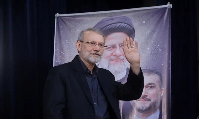 Ali Larijani, former chairman of the parliament of Iran, waves at a press conference after registering as a candidate for the presidential election at the Interior Ministry, in Tehran, Iran May 31, 2024. &mdash; AFP/File