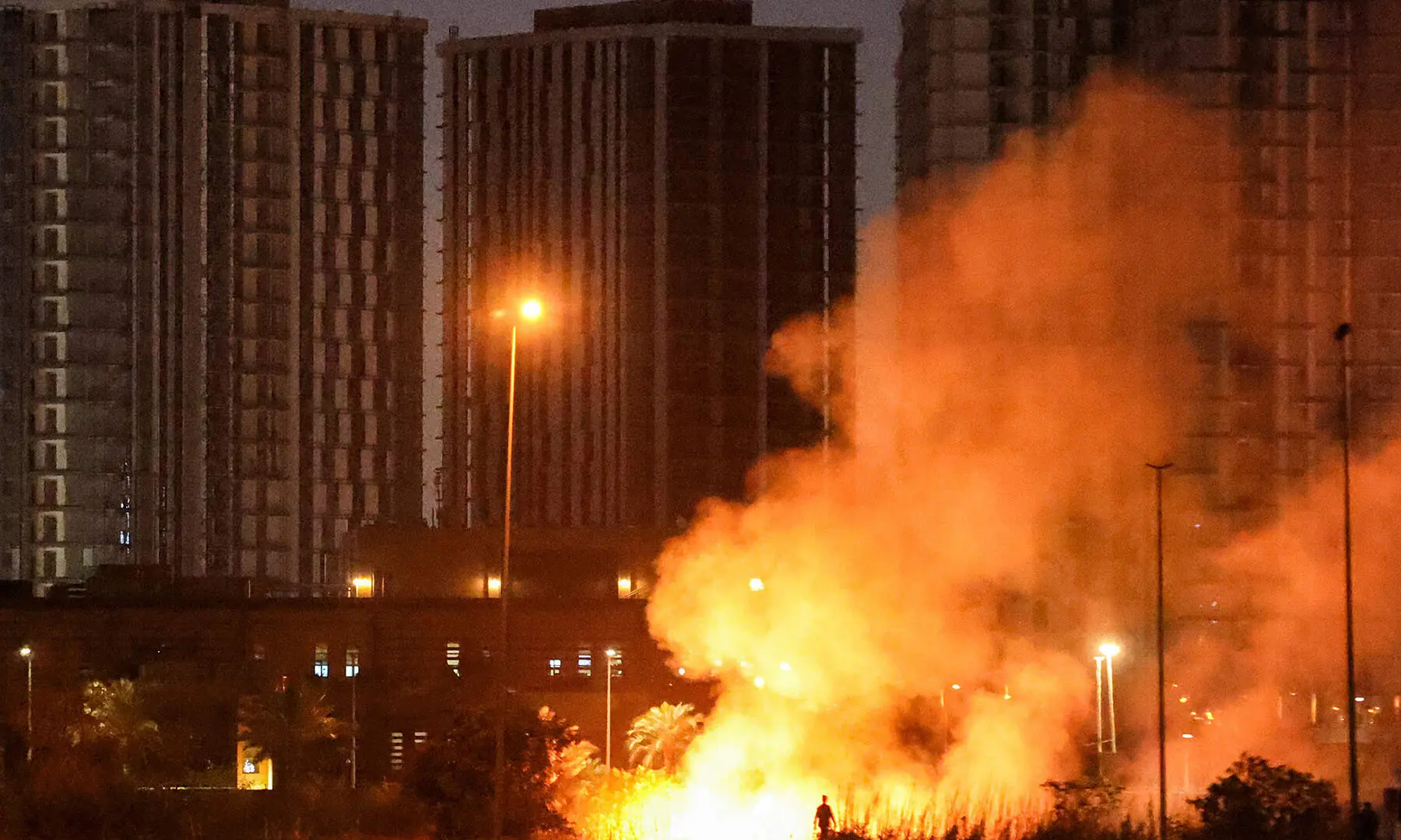 A fire burns outside the grounds of the US Embassy headquarters in Baghdad&rsquo;s fortified &ldquo;Green Zone&rdquo;, in Iraq on on March 17, following a drone and rocket attack. &mdash; AFP
