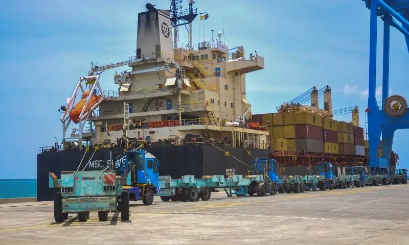 A vessel docks to offload shipping containers after it was diverted amid the US-Israeli conflict with Iran, Lamu Port in Lamu County, Kenya on March 18, 2026. &mdash; Reuters