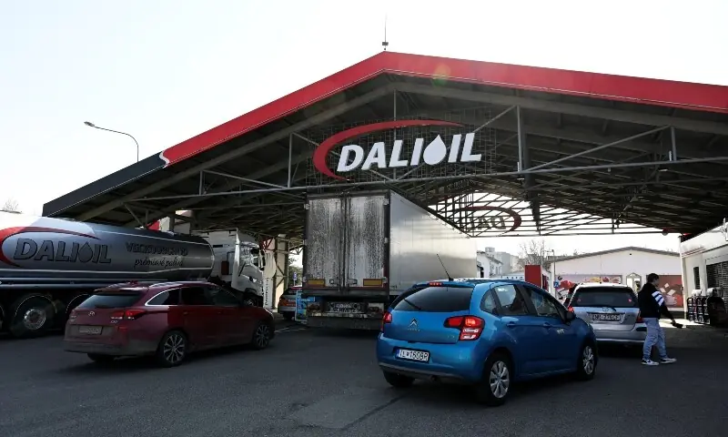 Cars wait to be refuelled at Dalioil gas station in Dubnica nad Vahom, Slovakia on March 18, 2026. &mdash; Reuters