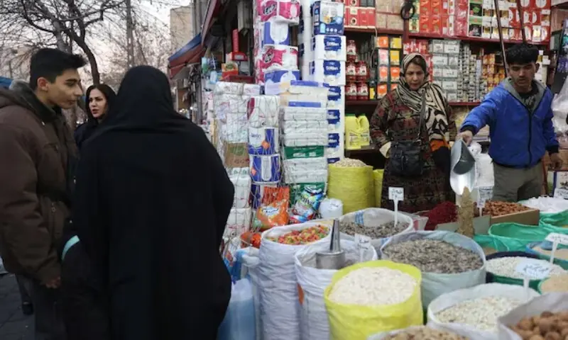 An Iranian woman shops in a local market in Tehran, Iran, January 5, 2026. &mdash;Majid Asgaripour/WANA/Reuters/File