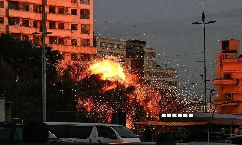 fireball rises from the site of an Israeli airstrike that targeted a building in Beirut&rsquo;s Bashoura neighbourhood early on March 18, 2026. &mdash;AFP