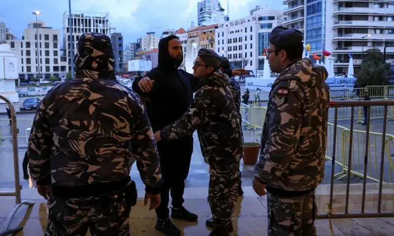A security personnel frisks a worshipper as she arrives to attend Eidul Fitr prayers at the Mohammad Al Amin Mosque, following an escalation between Hezbollah and Israel, amid the US-Israeli conflict with Iran, in Beirut, Lebanon, March 20, 2026. &mdash;Reuters