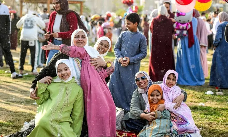 Revellers gather in a public garden after the early morning prayers for Eidul Fitr, near the Siddiq Mosque in eastern Cairo&rsquo;s Heliopolis district on March 20, 2026. &mdash; AFP