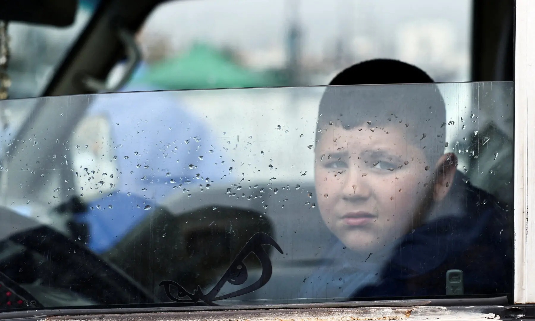 A displaced child from Beirut&rsquo;s southern suburbs looks on from inside a van on the day worshippers attend Eid prayers to mark the end of Ramazan, following an escalation between Hezbollah and Israel amid the US-Israeli war on Iran, in Beirut, Lebanon, March 20, 2026. &mdash; Reuters