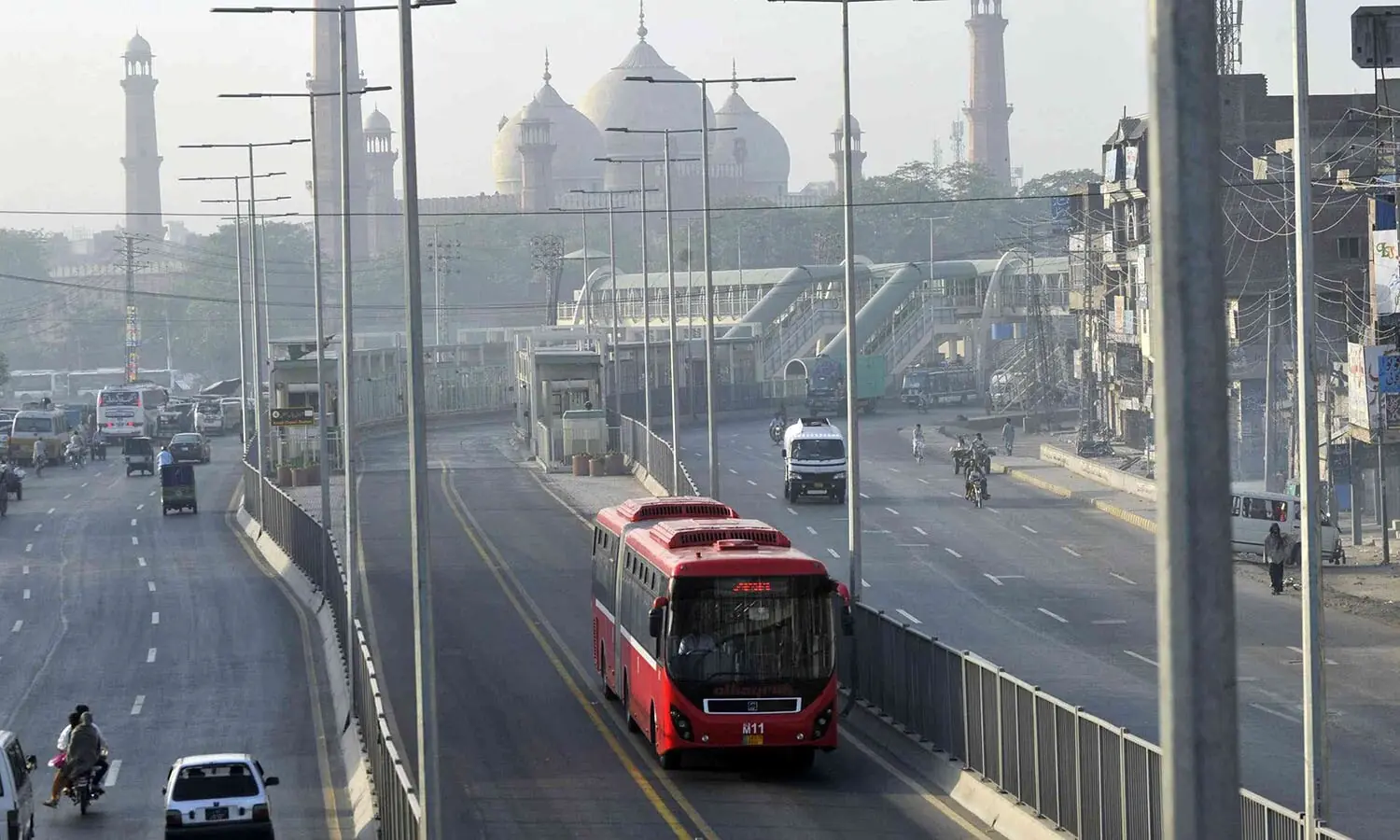 A metro bus travels in Lahore.&mdash;AFP/File