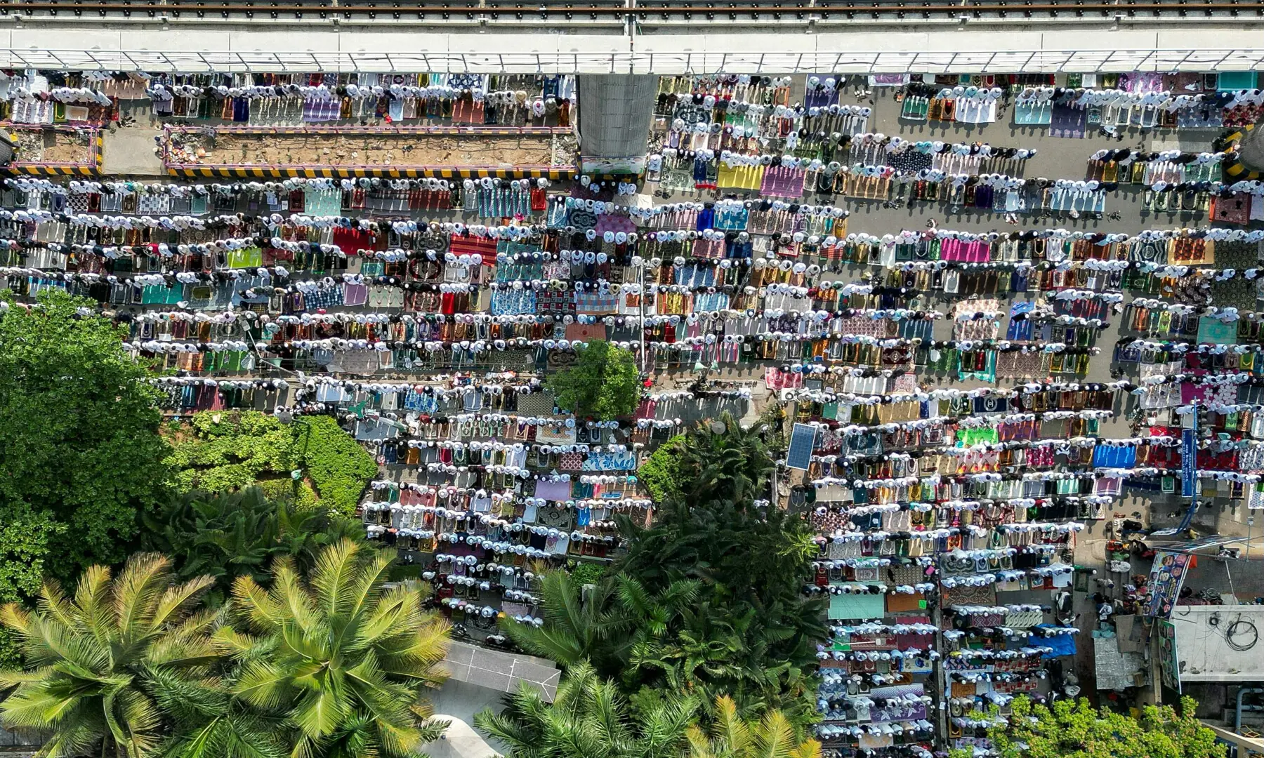 An aerial view shows Muslim offering Eidul Fitr prayers, at the Masjid-i-Bilal in Bengaluru, India on March 21, 2026. &mdash; AFP