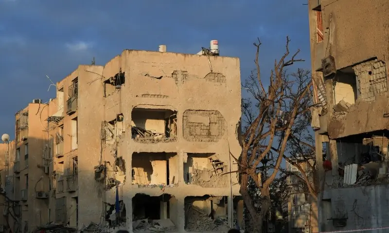 Damaged buildings after Iranian missile barrages struck area in Arad, amid the US-Israel conflict with Iran, in southern Israel, March 22. &mdash; Reuters