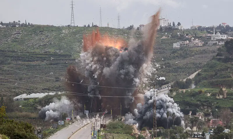Smoke rises after an Israeli strike on a bridge, following an escalation between Hezbollah and Israel, near Qasmiyeh, Lebanon on March 22. &mdash; Reuters