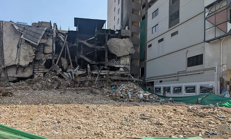 An image from outside the remains of Karachi&rsquo;s Gul Plaza shopping centre on March 22. &mdash; Photo via author