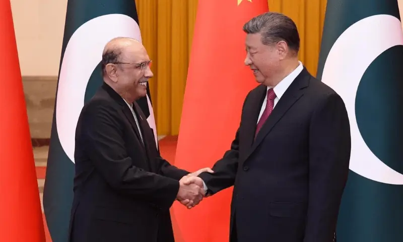 Chinese President Xi Jinping welcomes President Asif Ali Zardari upon his arrival at the Great Hall of the People in Beijing on February 5. &mdash; PID/File
