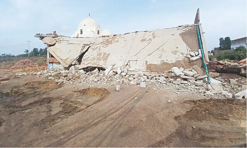 RUBBLE of demolished structures at the site.&mdash;Dawn