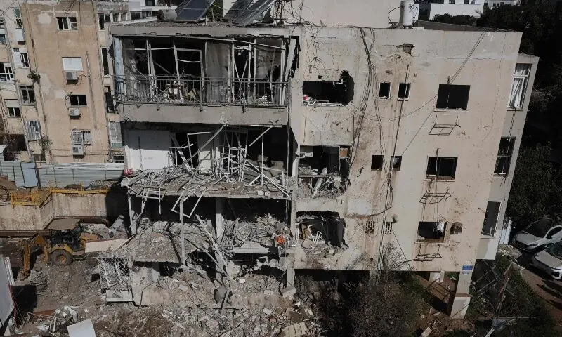 This picture shows a damaged building at the site of an Iranian missile strike in Tel Aviv on March 24, 2026. &mdash;AFP