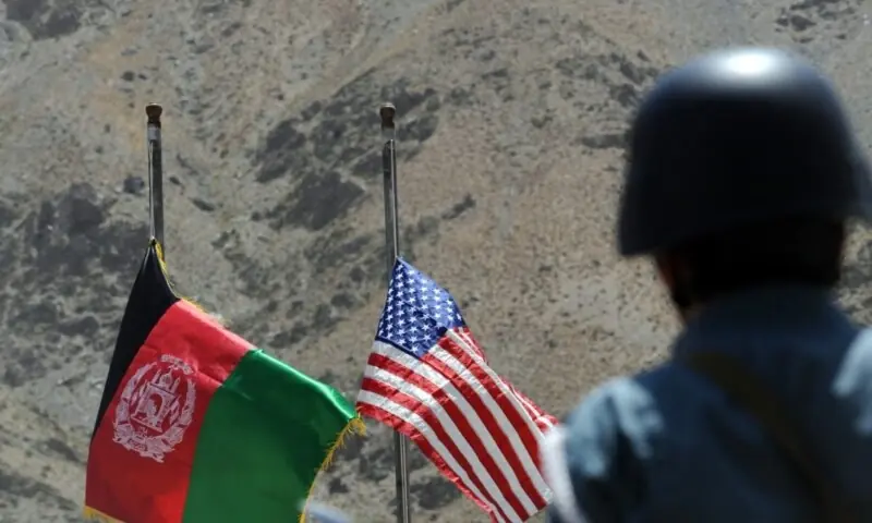The image shows flags of Afghanistan and the United States. &mdash; AFP/File