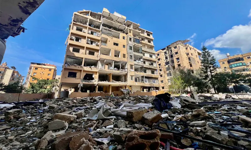 Debris is scattered around damaged buildings in the aftermath of overnight Israeli strikes in Beirut&rsquo;s southern suburbs.&mdash;Reuters