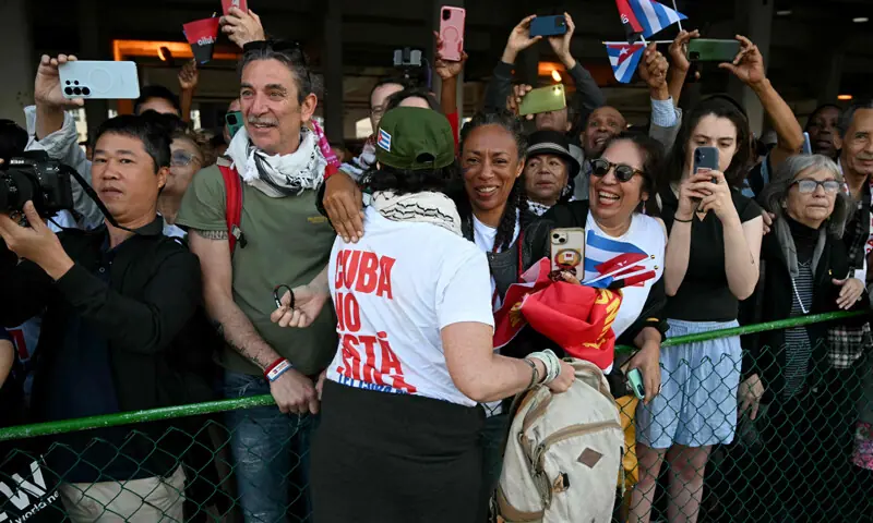 Activists greet residents after a ship arrived at the port of Havana from Mexico with humanitarian aid for Cuba.—AFP Activists greet residents after a ship arrived at the port of Havana from Mexico with humanitarian aid for Cuba.—AFP
