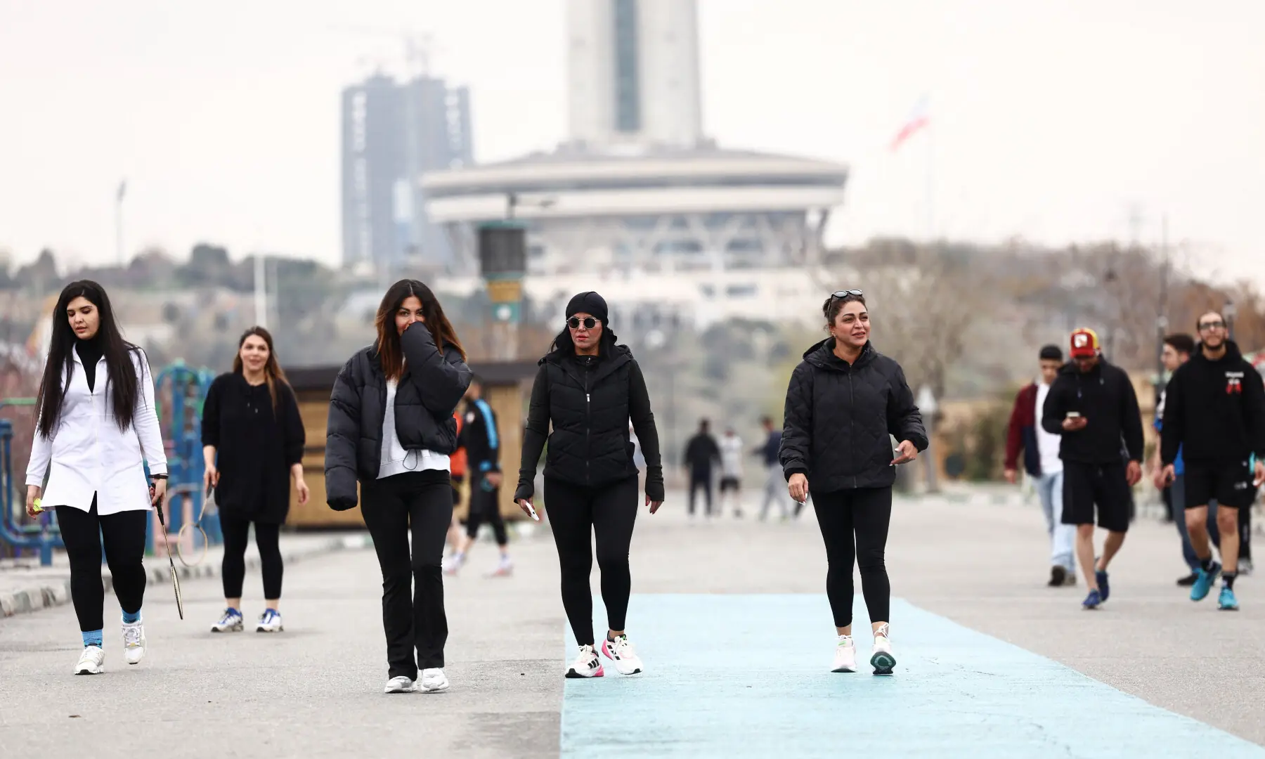 Iranian women walk at Pardisan Park, amid the US-Israeli war on Iran, in Tehran, Iran on March 25, 2026. &mdash; WANA via Reuters