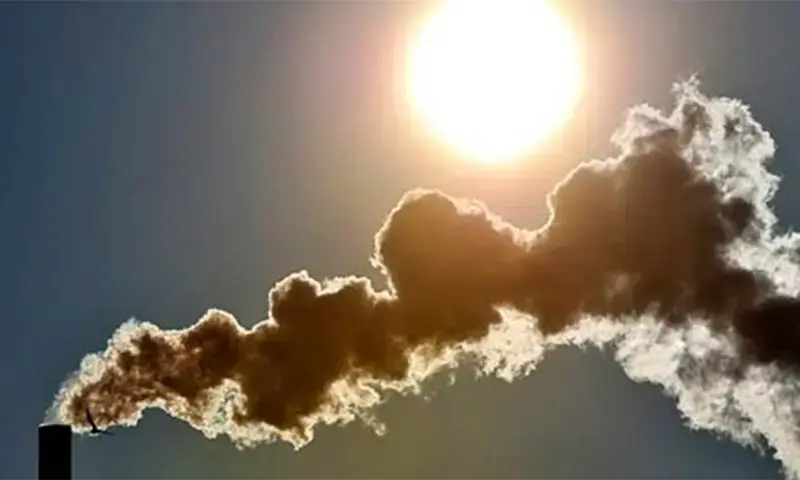 A file photo showing factory emissions under a bright sun. ─ AFP/File A file photo showing factory emissions under a bright sun. ─ AFP/File