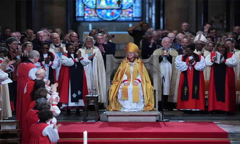 MEMBERS of the clergy and the congregation applaud after Dame Sarah Mullally was installed as Archbishop of Canterbury.&mdash;Reuters