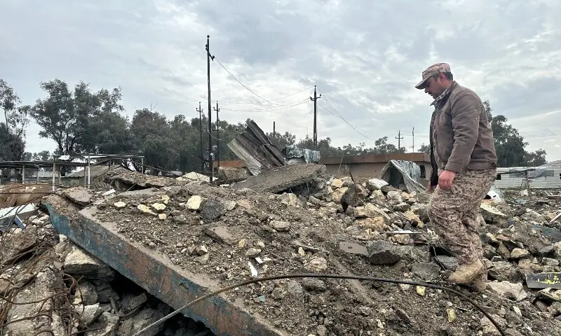 An Iraqi soldier inspects the site of an airstrike at a military medical clinic, where Iraqi security sources said several soldiers were killed and wounded, in western Anbar province, Iraq, March 26, 2026. &mdash;AFP