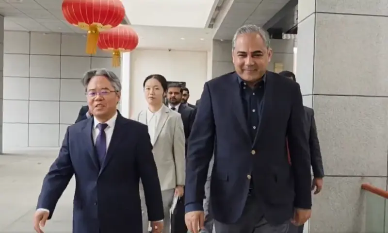 Interior Minister Mohsin Naqvi walks with Chinese Ambassador Jiang Zedong at the Chinese Embassy in Islamabad on March 27. &mdash; screengrab via MOIofficialGoP/X