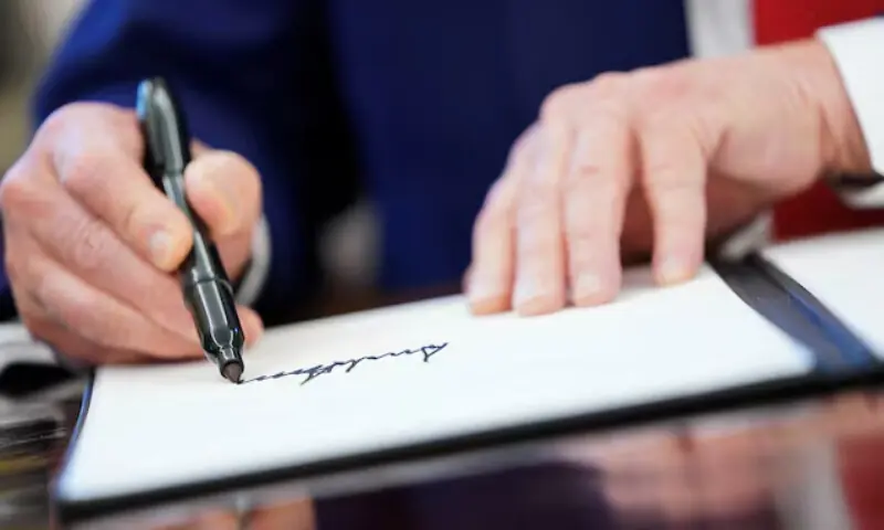 US President Donald Trump writes his signature, as he signs executive orders and proclamations in the Oval Office at the White House in Washington, DC, US, April 9, 2025. — Reuters US President Donald Trump writes his signature, as he signs executive orders and proclamations in the Oval Office at the White House in Washington, DC, US, April 9, 2025. — Reuters