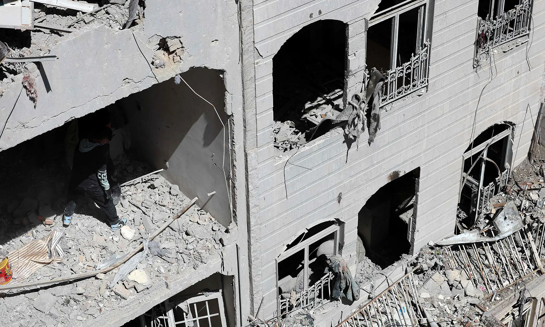 A picture shows a damaged residential building in southern Tehran, Iran on March 27. &mdash; AFP
