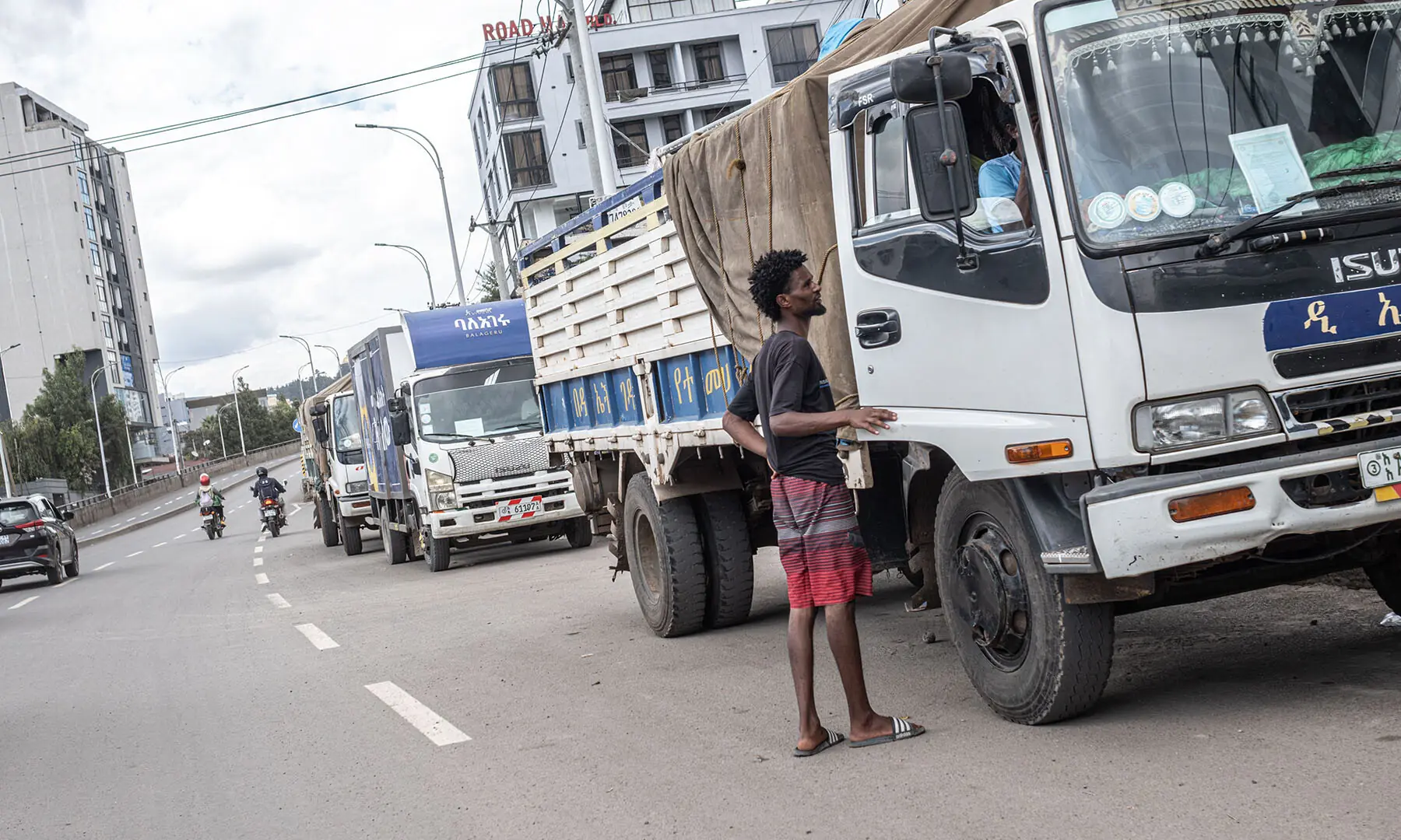Vehicles line up along a street as drivers wait to refuel at a petrol station during a fuel shortage in Addis Ababa, Ethiopia on March 27. &mdash; AFP