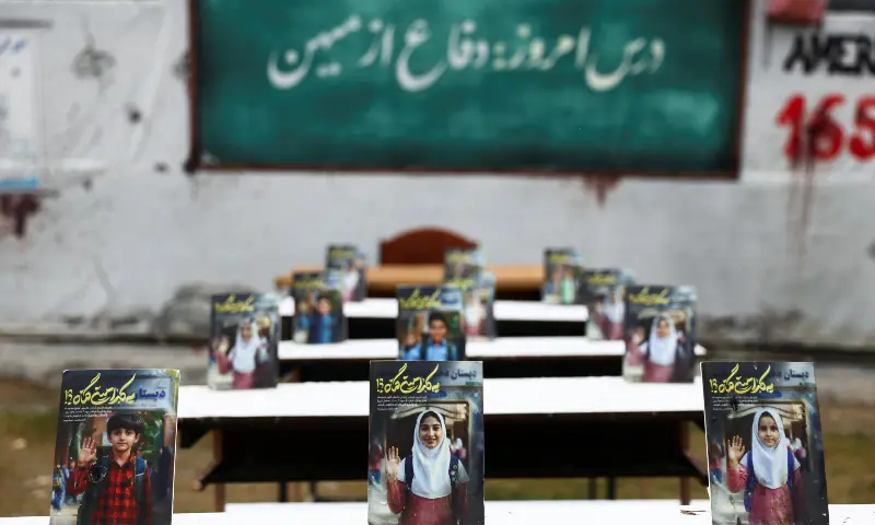 Pictures of child victims killed in strikes, are displayed in a square, amid the US-Israeli conflict with Iran, in Tehran, Iran on March 28, 2026. &mdash; WANA via Reuters