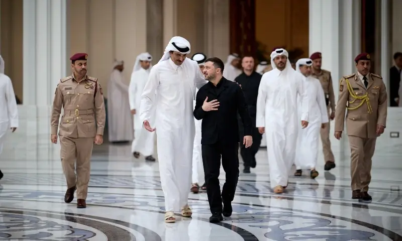 This handout photograph released by the Ukrainian Presidential Press Service on March 28 shows Ukraine&rsquo;s President Volodymyr Zelensky (C-R) and Qatar&rsquo;s Emir Sheikh Tamim bin Hamad Al-Thani (C-L) during their meeting in Doha, Qatar. &mdash; AFP