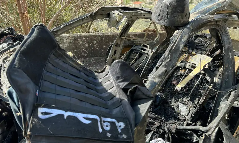 A bullet-proof vest with the Arabic word for &ldquo;Press&rdquo; is displayed atop the husk of a destroyed vehicle that was used by a media crew of journalists, who were killed in an Israeli strike earlier, along the side of a road leading to Jezzine in southern Lebanon on March 28, 2026. &mdash; AFP