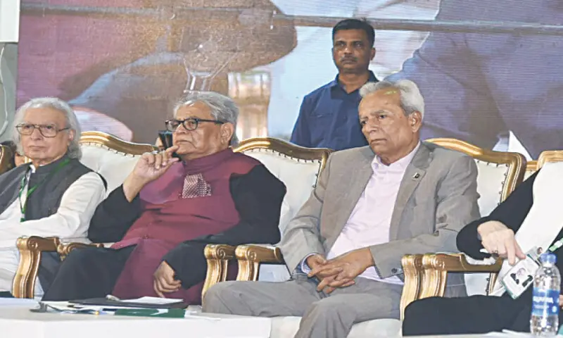 Dr Pirzada Qasim, Iftikhar Arif and Sindh Governor Nehal Hashmi at the mushaira.&mdash;Dawn