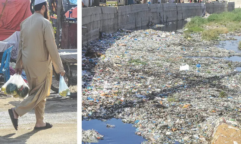 A man carrying polythene bags walks by as a city drain (right) is choked mostly with plastic bags.
—Fahim Siddiqi / White Star A man carrying polythene bags walks by as a city drain (right) is choked mostly with plastic bags.
—Fahim Siddiqi / White Star