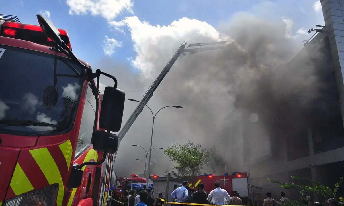 Firefighters are struggling to extinguish a fire that erupted in the basement of a superstore in the Zamzama area during the early hours of Monday. — APP Firefighters are struggling to extinguish a fire that erupted in the basement of a superstore in the Zamzama area during the early hours of Monday. — APP
