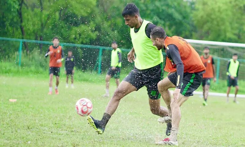 ISLAMABAD: Pakistan’s football players in action during a training session at the Baseball Ground on Monday.—Courtesy PFF ISLAMABAD: Pakistan’s football players in action during a training session at the Baseball Ground on Monday.—Courtesy PFF