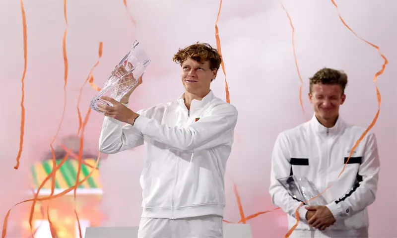 JANNIK Sinner of Italy celebrates with the Butch Buchholz Trophy after defeating Jiri Lehecka (R) of the Czech Republic in the Miami Open final at the Hard Rock Stadium.—AFP JANNIK Sinner of Italy celebrates with the Butch Buchholz Trophy after defeating Jiri Lehecka (R) of the Czech Republic in the Miami Open final at the Hard Rock Stadium.—AFP