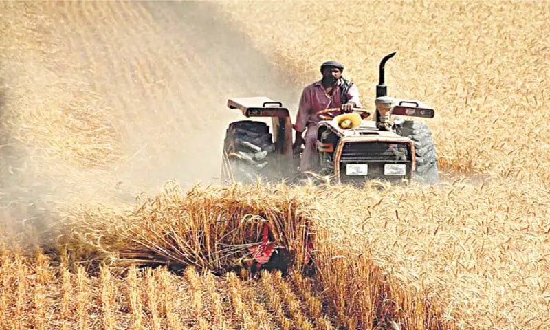 A file photo of a tractor in a field. — APP/file A file photo of a tractor in a field. — APP/file