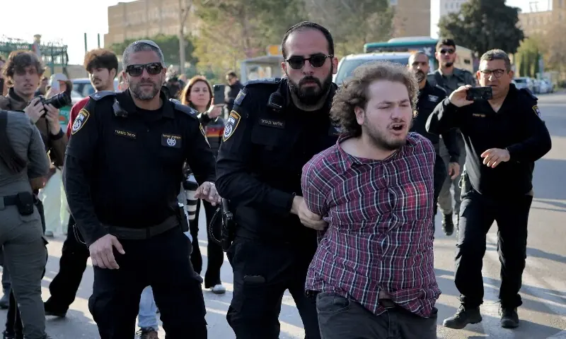 Israeli security detain protesters that had gathered outside the Knesset, the Israeli parliament, in Jerusalem on March 31, 2026, during a demonstration against the passing of a law allowing for the death penalty against Palestinians. — AFP