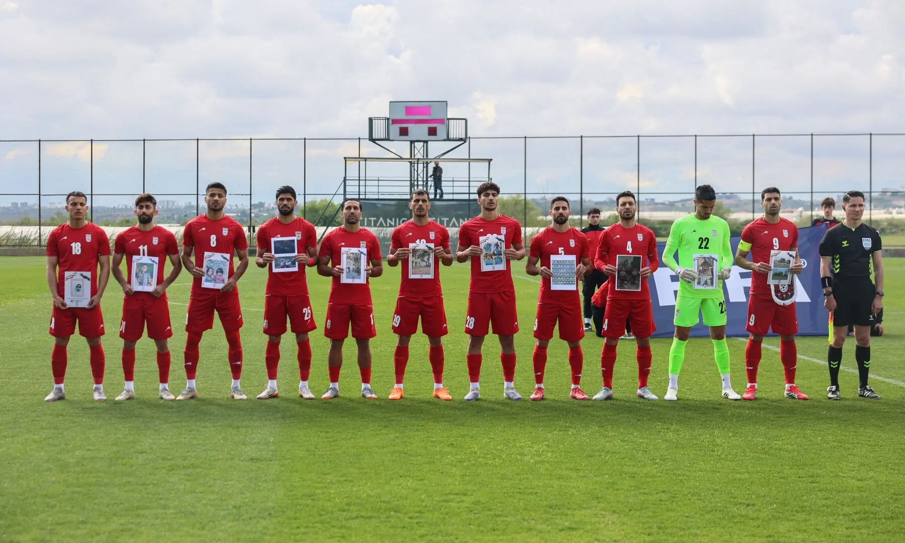 Iran&rsquo;s national football team poses with pictures of children said to have been killed in a US strikes in Iran, before a friendly football match between Iran and Costa Rica, in Antalya, southern Turkiye on March 31. &mdash; AFP