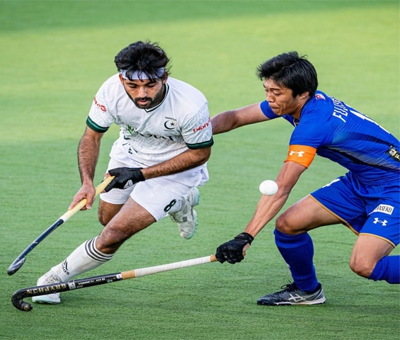 ISMAILIA: Players in action during the World Cup Qualifier semi-final between Pakistan and Japan on Friday.&mdash;Courtesy FIH
