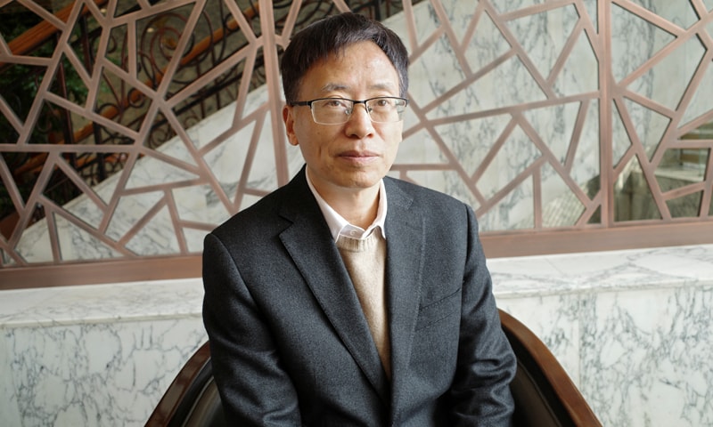 BRAIN-computer interface scientist Yao Dezhong poses for pictures during an interview in Beijing.&mdash;Reuters
