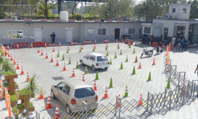 Learners navigate through obstacles at the police driving school. Learners navigate through obstacles at the police driving school.