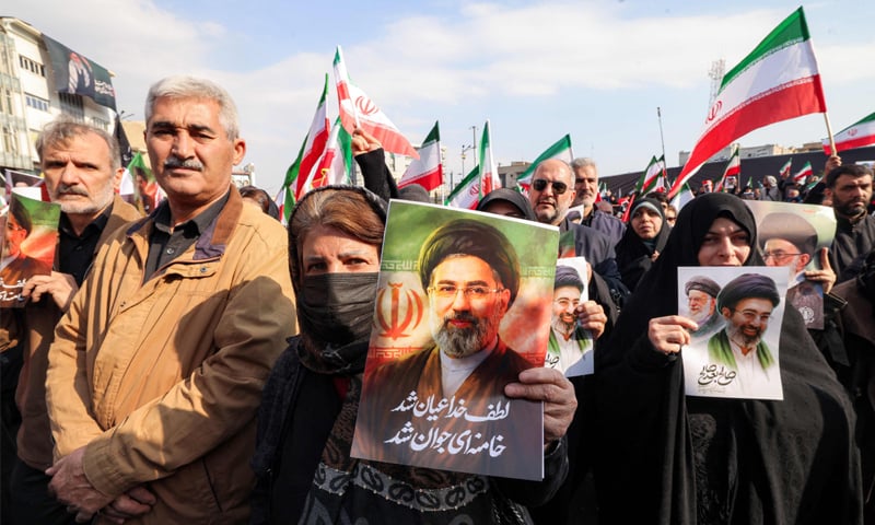 WOMEN hold posters of Iran&rsquo;s new supreme leader, Ayatollah Mojtaba Khamenei, during a rally held to express support for him, at Tehran&rsquo;s Enqelab Square.&mdash;AFP
